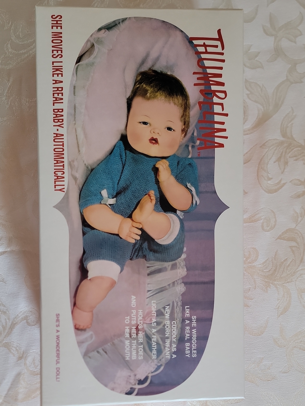 Ashton Drake Thumbelina Porcelain Baby Doll in Blue Knit Outfit